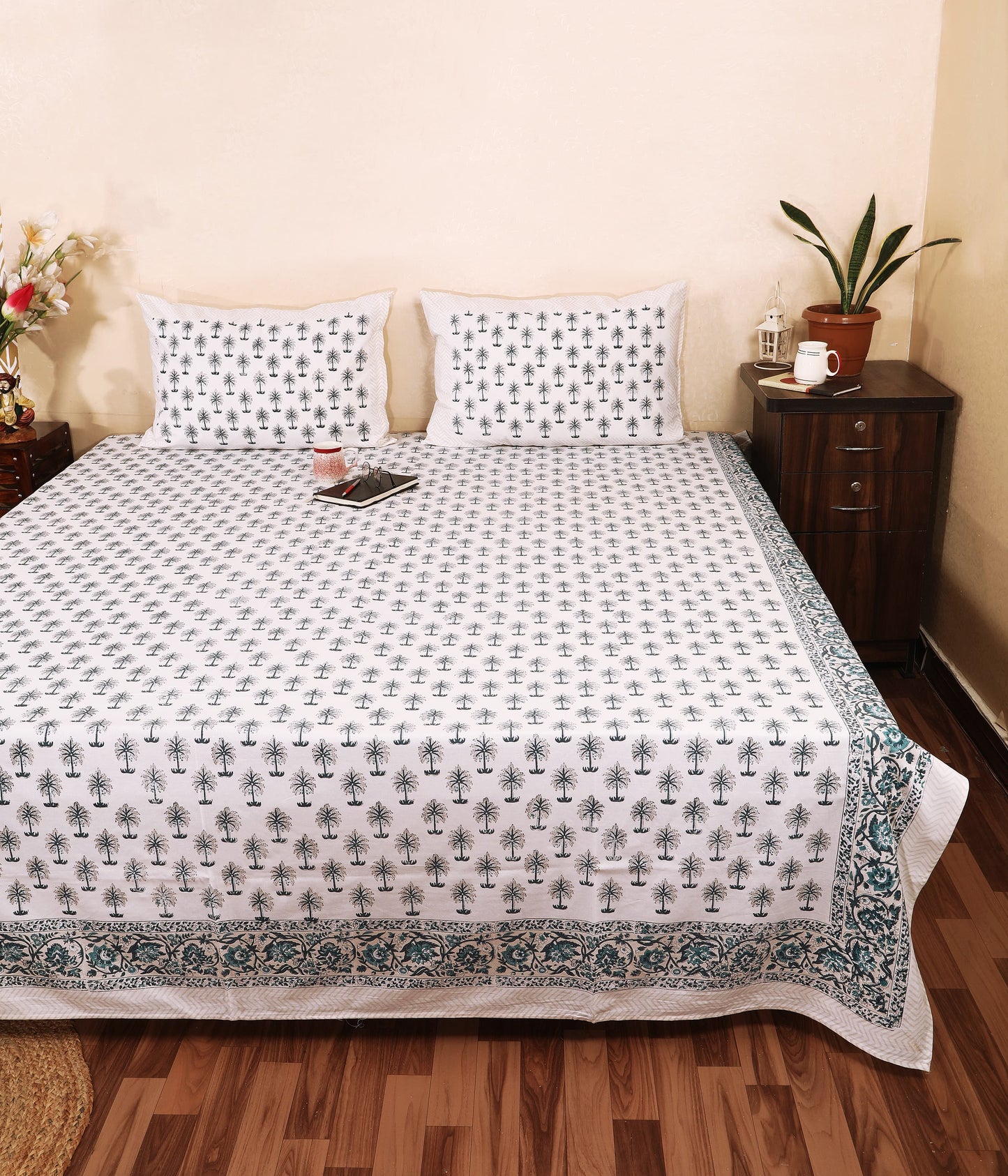 Highmour palm tree print fabric bedsheet with matching pillow covers and intricate border design