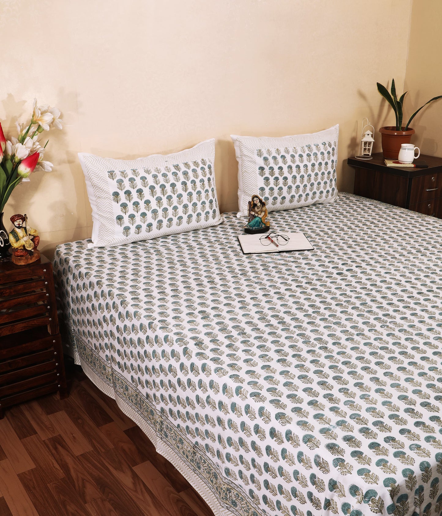 Highmour bedsheet in sage leaf print fabric with matching pillow covers for a stylish bedroom