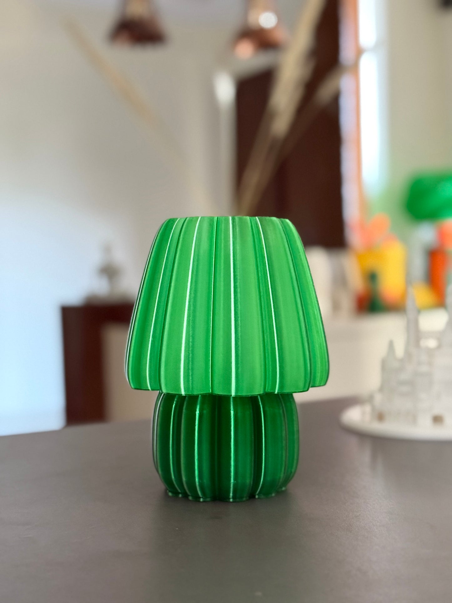 Green decorative lamp with pleated design for a soft glow night lamp experience