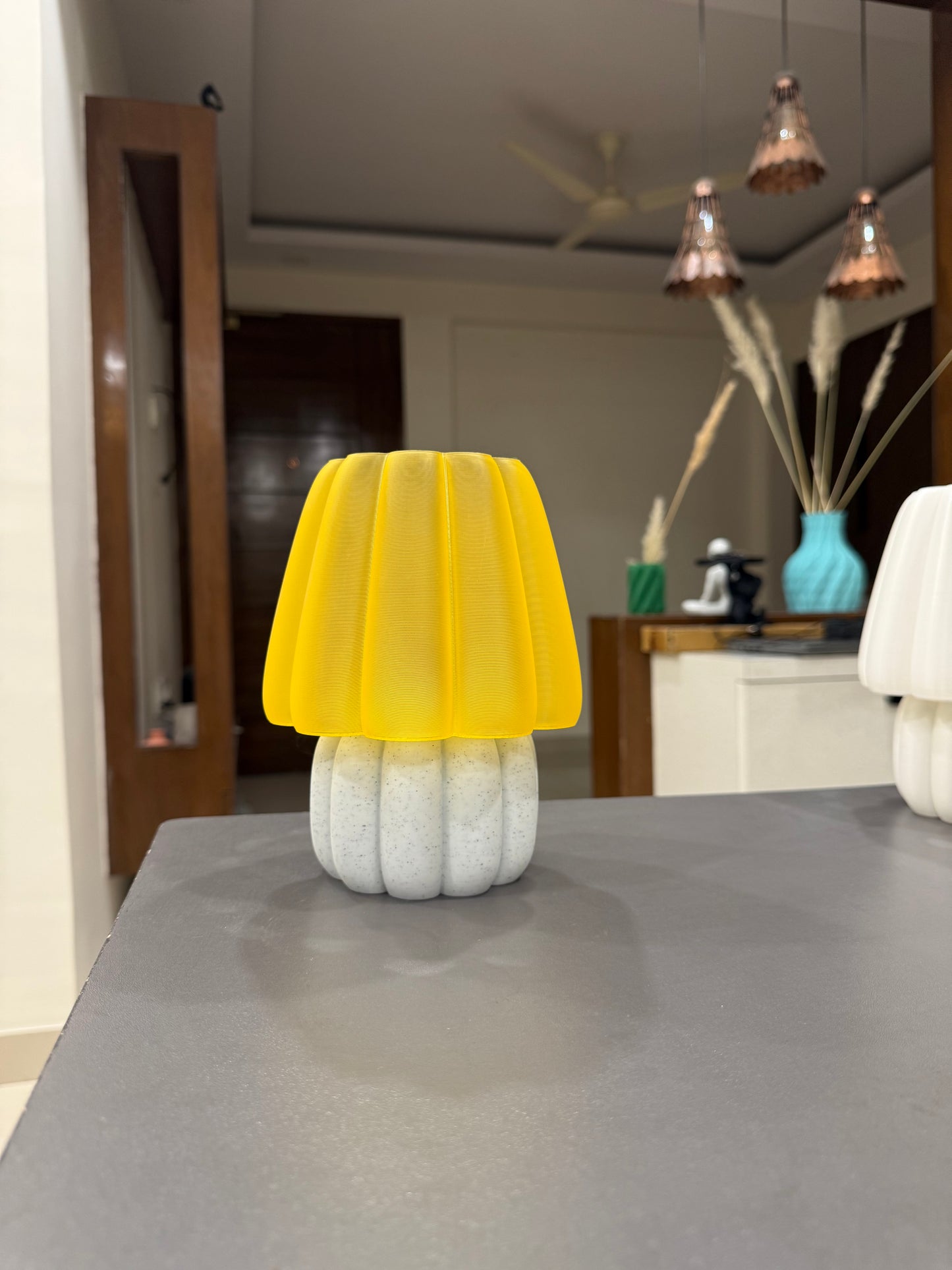 Unique yellow soft glow night lamp with a textured base perfect for cozy lighting