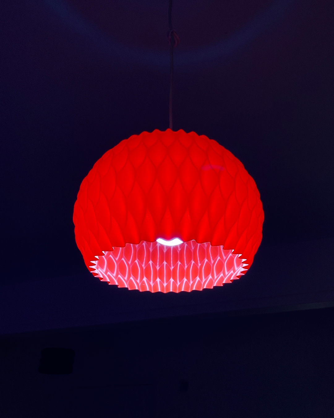 Highmour unique pendant lighting with a bold red design featuring textured surface for modern decor