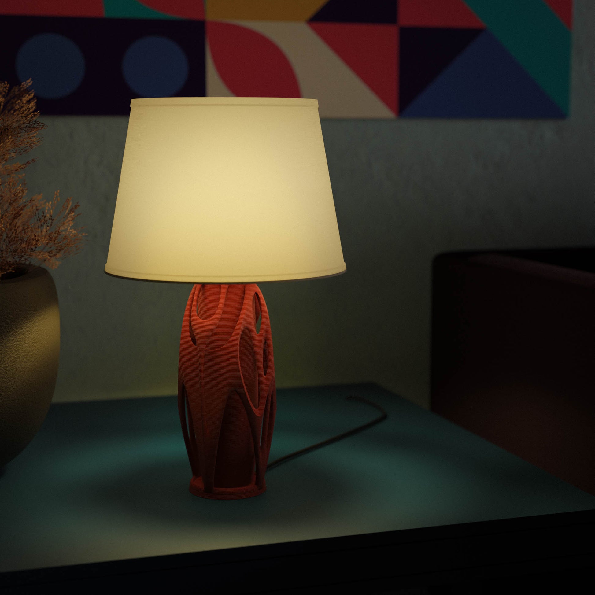 Highmour aesthetic designer lamp with a vibrant orange base and white shade for modern decor
