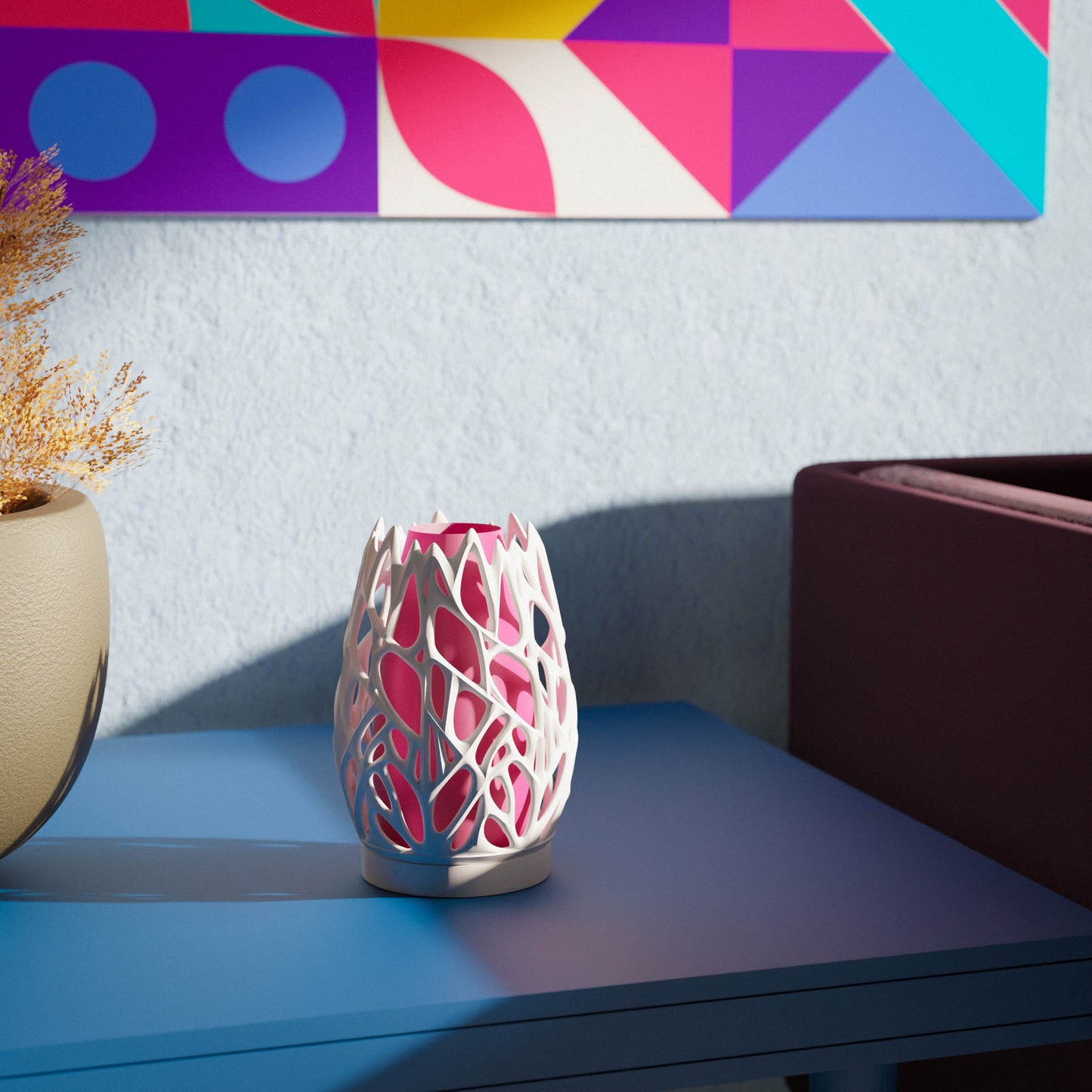 Highmour aesthetic organic lamp with intricate design on a colorful tabletop beside a plant