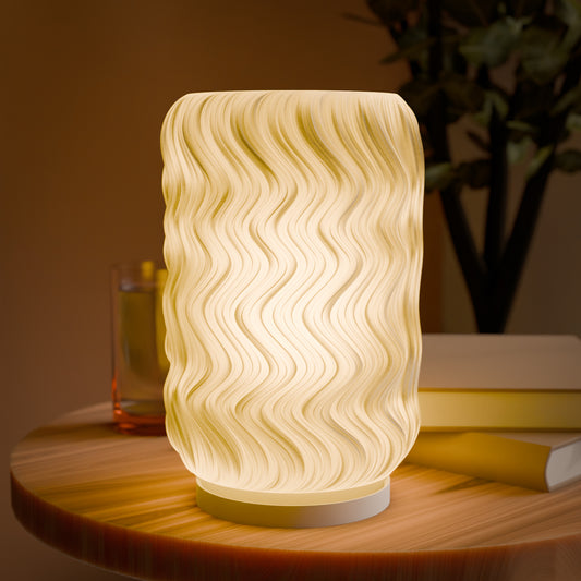 Highmour decorative bedside lamp with a wavy design providing warm ambient light for soothing bedrooms