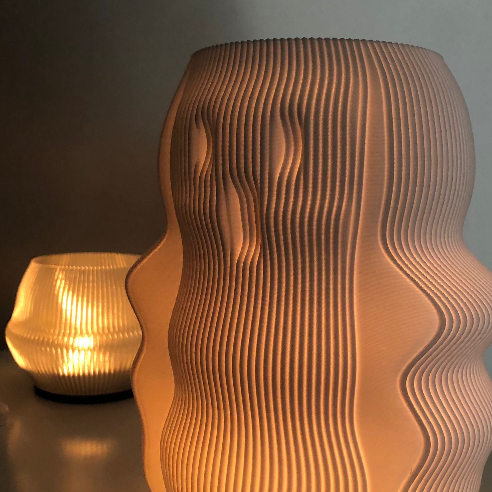 Modern decorative lamp with a unique ribbed design, providing soft ambient light for any space