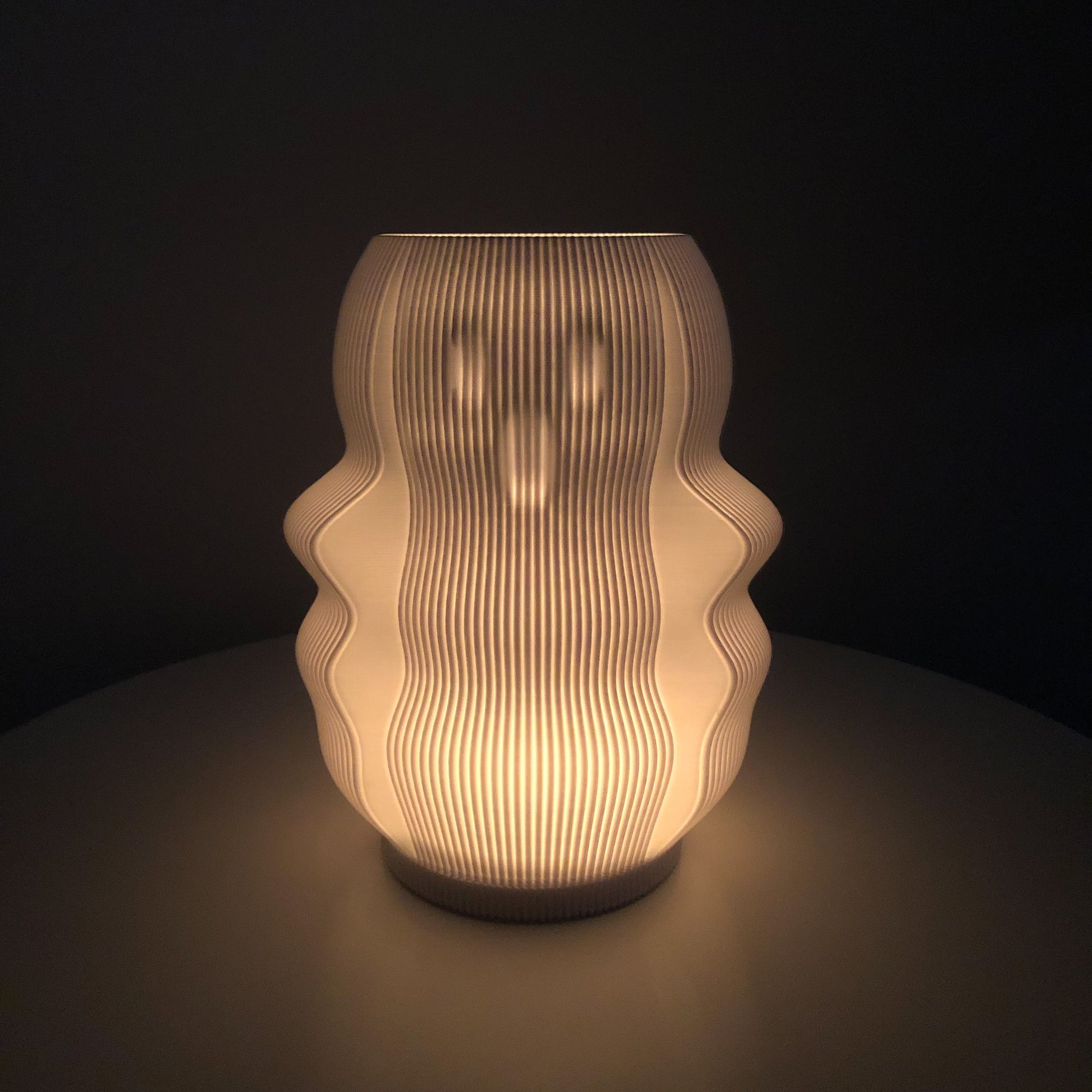 My Store modern decorative lamp in textured white design, creating a warm ambient glow