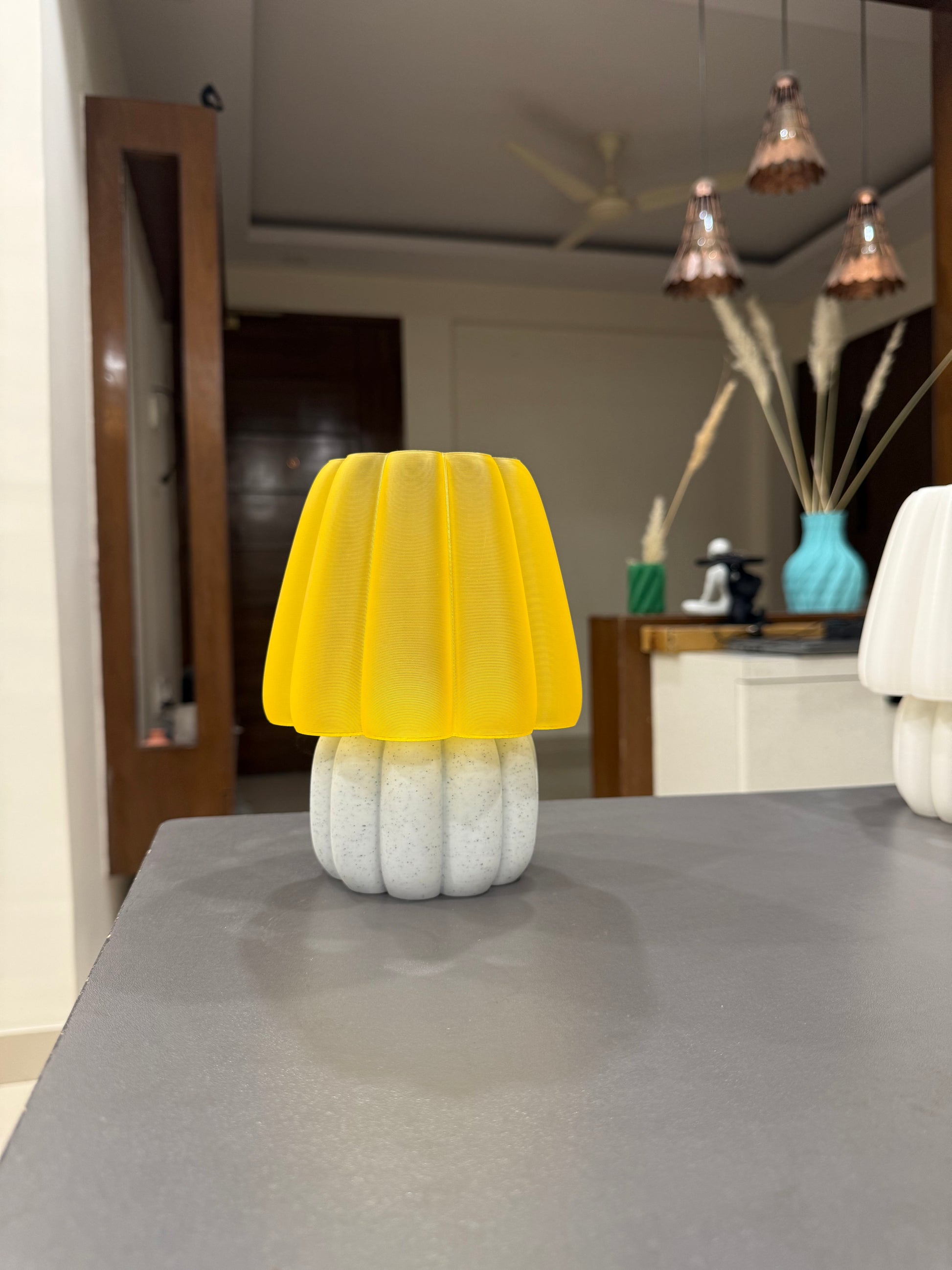 Unique yellow soft glow night lamp with a textured base perfect for cozy lighting