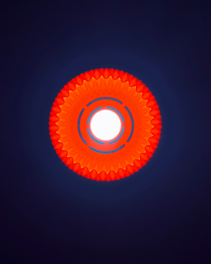 Unique pendant lighting in vibrant red with a textured circular design for modern home decor