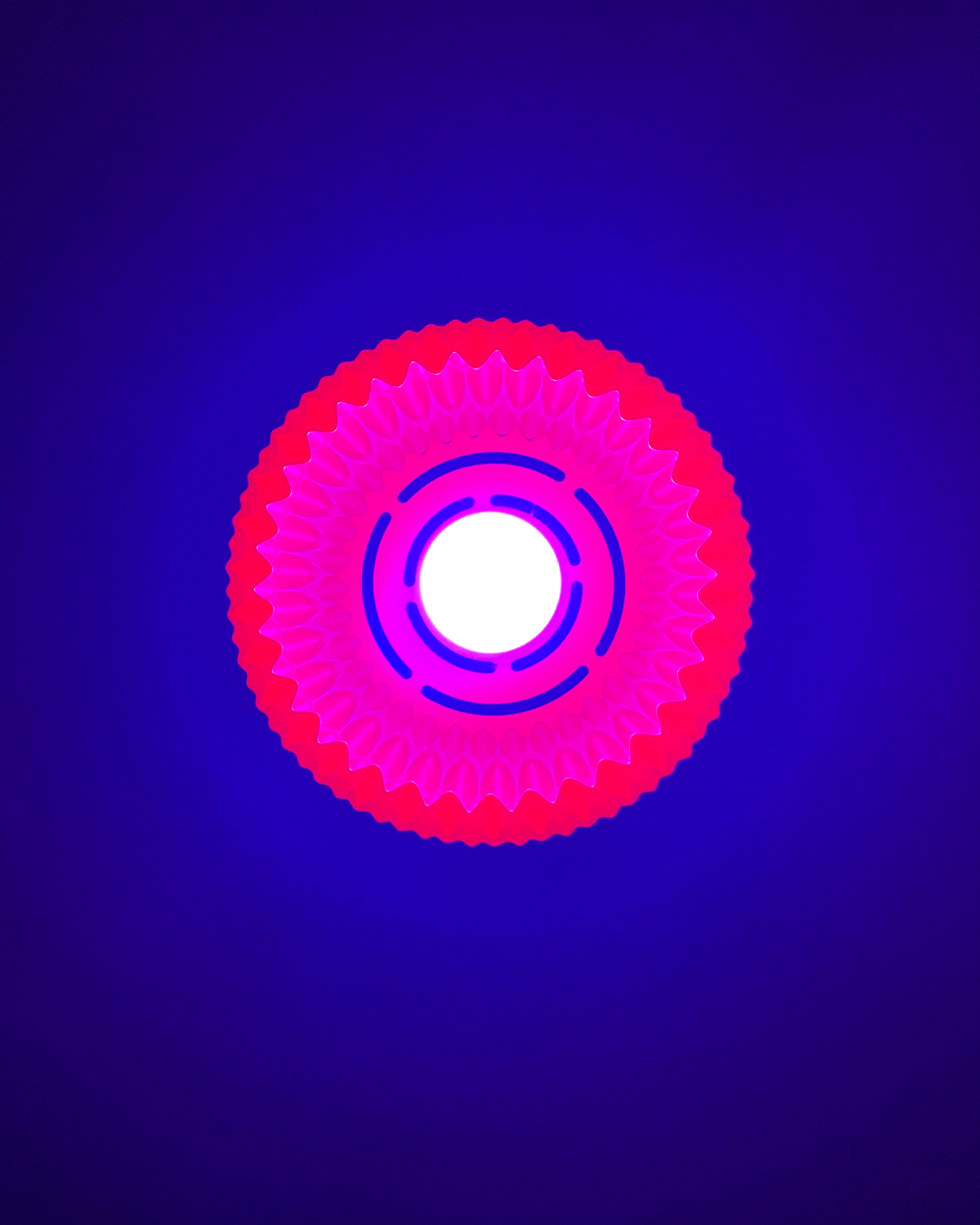 Highmour unique pendant lighting featuring a vibrant pink and purple design with circular patterns