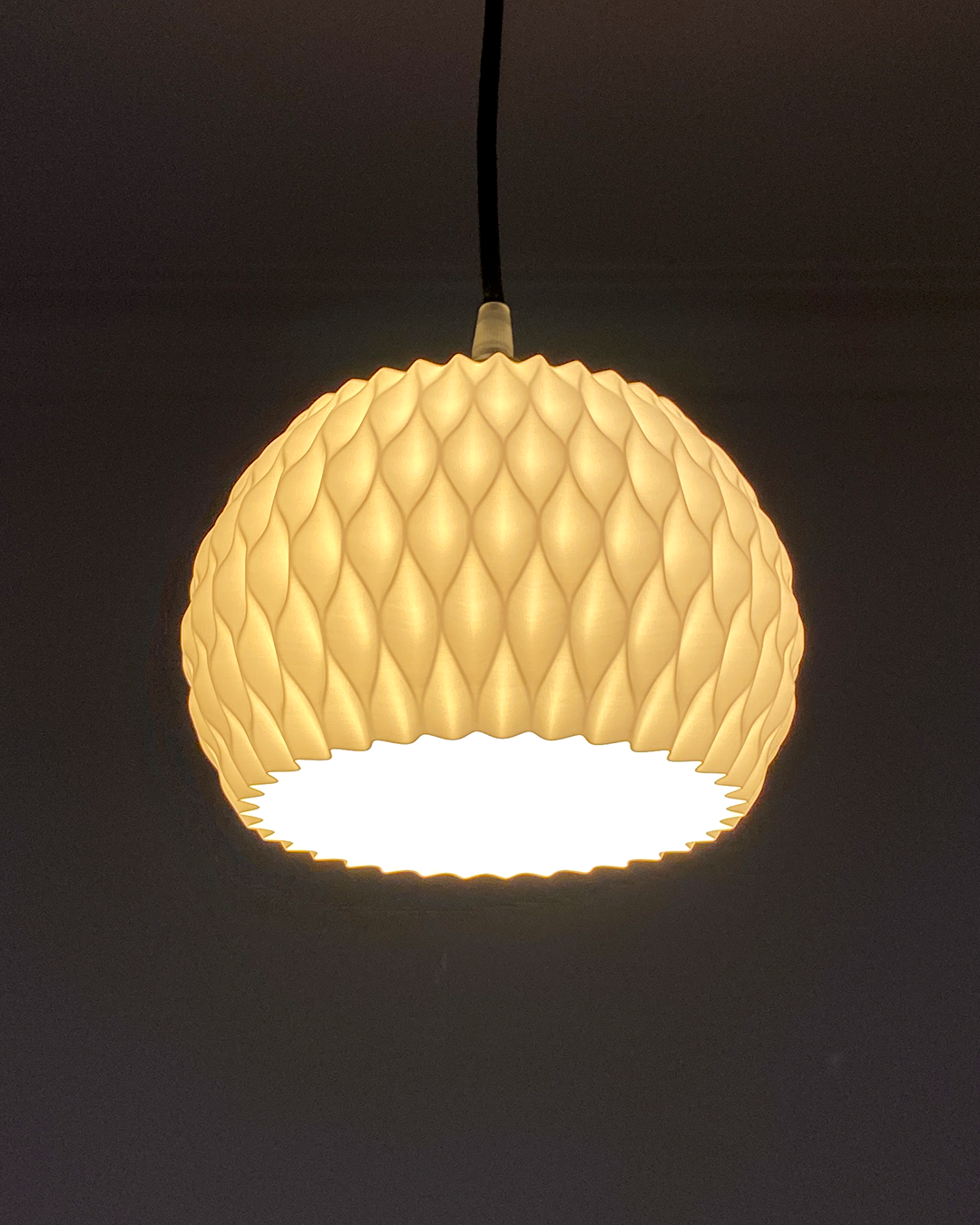Unique pendant lighting in a textured white design, perfect for modern home decor