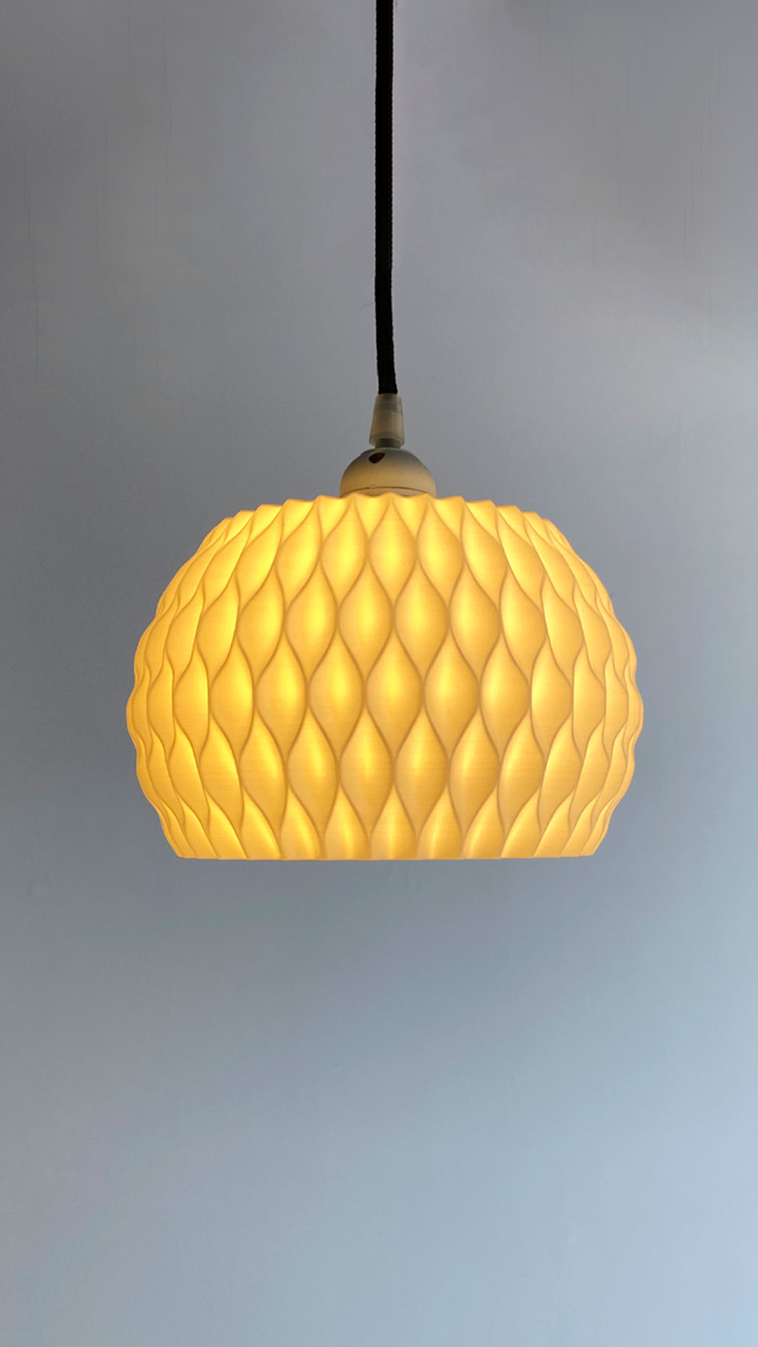 Highmour unique pendant lighting with a textured design, emitting a warm glow for stylish interiors