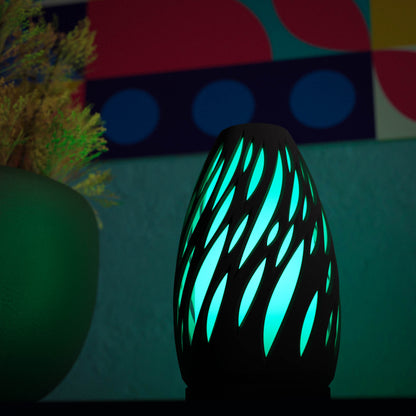 Highmour unique silhouette lamp with a modern design that glows in vibrant blue tones