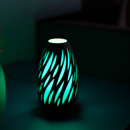 Highmour unique silhouette lamp with a modern design that emits a soothing blue glow