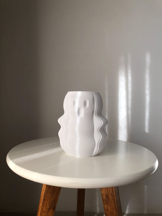 My Store unique white vase with an artistic wavy design displayed on a white table